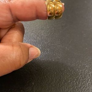 Gold pierced earrings.